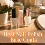 Various nail polish base coats arranged on a surface.