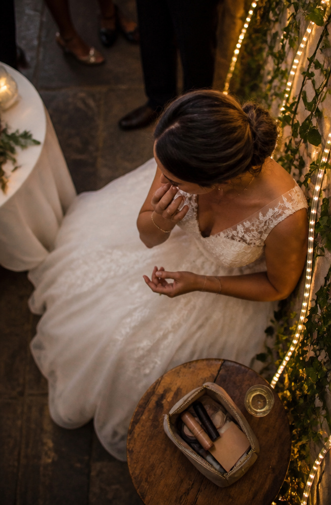 Natural Wedding Day Makeup: A 2026 Guide to Styles and Methods 5 Clutch containing blotting papers, lip tint, and translucent powder.