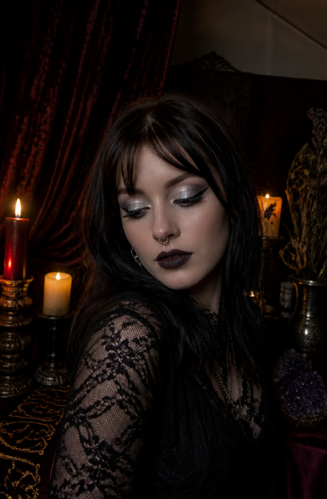 How to Do Easy Alt Makeup: 6 Steps for Alternative Looks in 2026 6 Model with frosty silver eyeshadow and blackened plum lipstick in a dim room.
