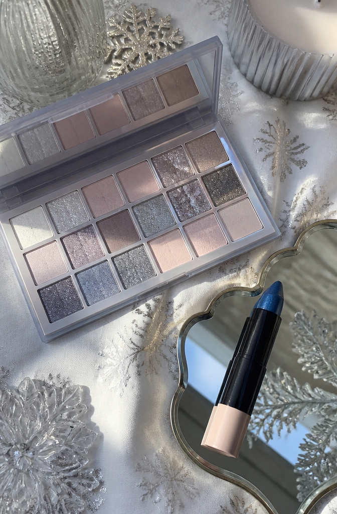 Icy Makeup Look: Tutorial for Winter 2026 in 7 Steps 9 Various cool-toned eyeshadow palettes with frosty shades displayed.